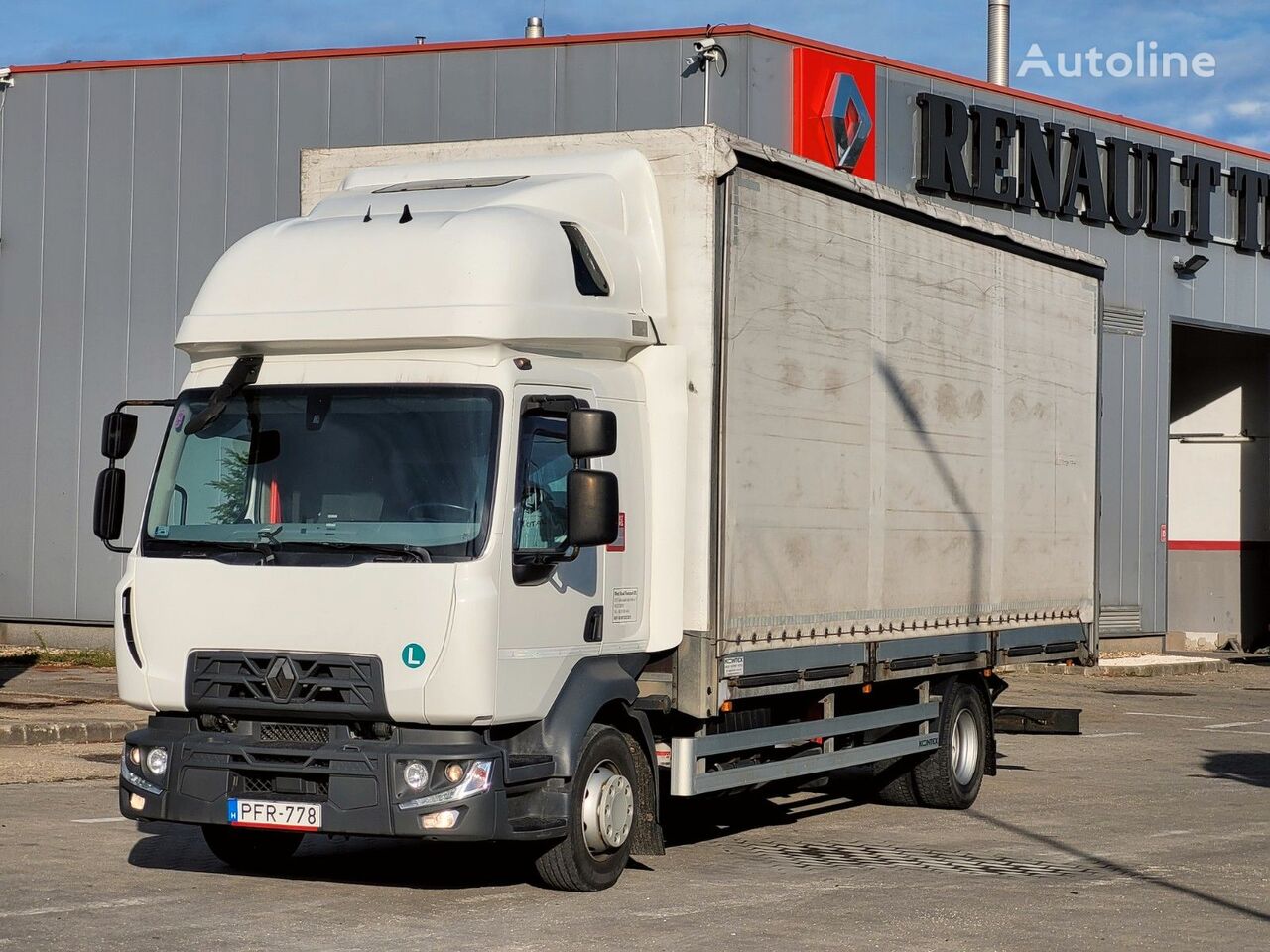 camion rideaux coulissants Renault D 12 MED R 240